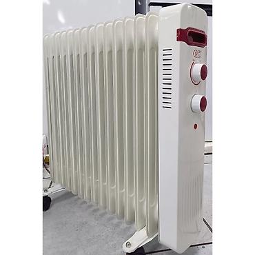 Масляные обогреватели: Масляный обогреватель Кол-во секций: 7, Быстрый нагрев, Встроенный вентилятор, Несколько режимов мощности — 10