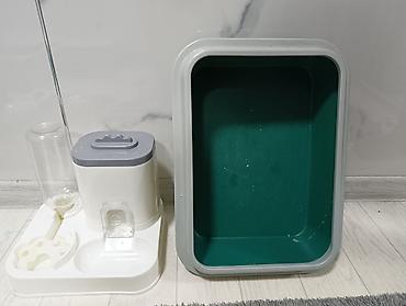 Набор для кошки: лоток + автокормушка с поилкой Состав: - Пластиковый