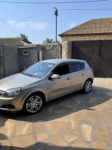 Opel: Opel Astra H – 5 qapılı hetçbek Xüsusiyyətlər: - Kuzov: 5 qapılı — 7