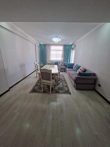 Yeni tikili: Mənzilin təsviri - Geniş, işıqlı zal: yumşaq pastel tonlarda divar — 2