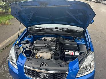011 ucuz: Kia Rio hetçbek, mavi rəngdə. Avtomobilin кузов tipi 5 qapılı — 8