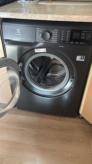 15 pro 256: Electrolux PerfectCare 600 paltaryuyan maşın - Ön yükləməli, qara — 1