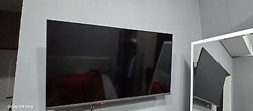 Televizorlar: Divardan asılan böyük ekran LED televizor. Xüsusiyyətlər: - Təxminən — 2