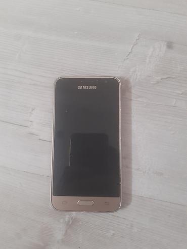 Mobil telefon və aksesuarlar: Samsung Galaxy J1, rəng - Qəhvəyi — 2