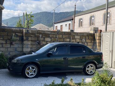 moto təkəri: Opel Astra: 1.8 l | 1999 il | 350000 km Sedan