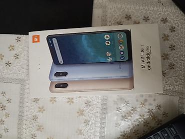 iphone 13 qiymet: Xiaomi Mi A2 Lite, rəng - Qara, 
 İki sim kartlı — 2