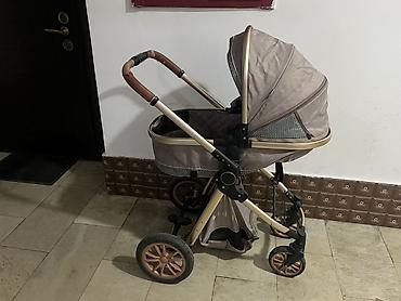 Uşaq arabası – çoxfunksiyalı, təkhissəli beşik/oturacaq modullu model