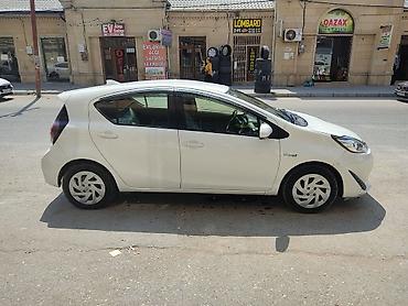 Toyota: Toyota Aqua hibrid hetçbek - Rəng: ağ - Korpus: 5 qapılı hetçbek — 2