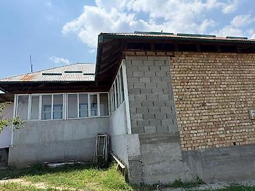 Продажа коттеджей и домов: Продаётся дом в Ошской области. Основные характеристики: - Материал — 2