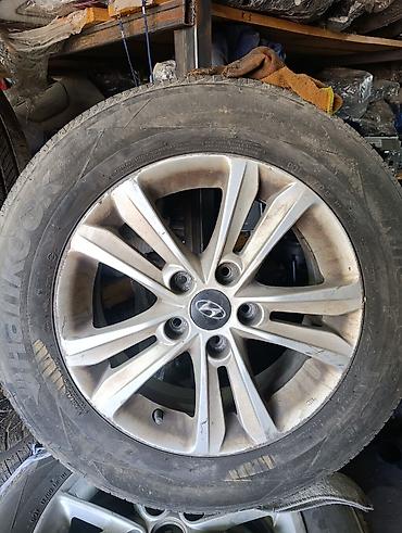 4 108: Литой диск Hyundai с шиной Hankook. Соната Характеристики по фото: - — 1