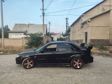 мазда з: Mazda 323: 2001 г., 2 л, Автоматтык, Бензин, Седан