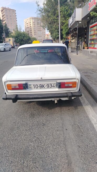 VAZ (LADA): VAZ 2106 sedan, ağ rəng. Klassik kuzov, 4 qapı, arxa ötürücülü. Ön və — 3