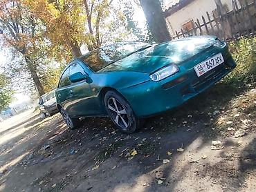 обмен на малолетражку: Mazda 323: 1996 г., 1.8 л, Механика, Бензин, Седан — 1