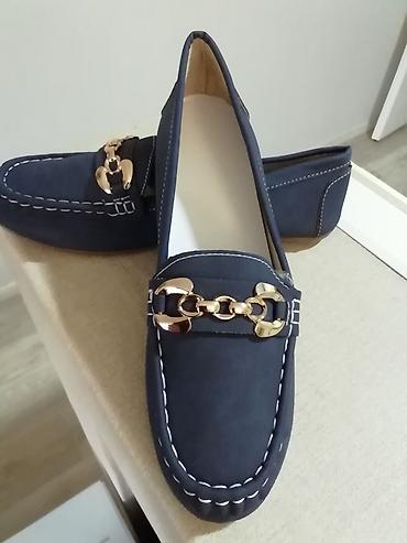 ugg sunjalice: Nove ženske teget mokasine 41 broj. Unutrašnje gazište 26 cm — 2