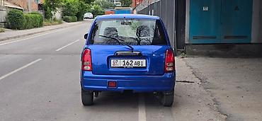 дейхатсу куоре: Daihatsu Cuore: 2003 г., 1 л, Автомат, Бензин, Хэтчбэк — 4