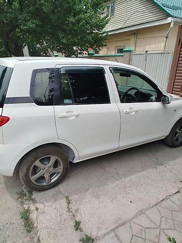 bid e5: Mazda 2: 2006 г. — 3