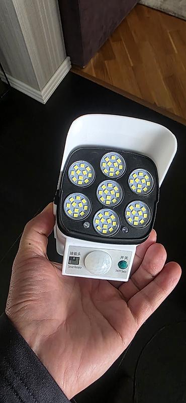 günəş projektoru: Məhsul: Günəş enerjili hərəkət sensorlu LED proyektor/saxta kamera — 3