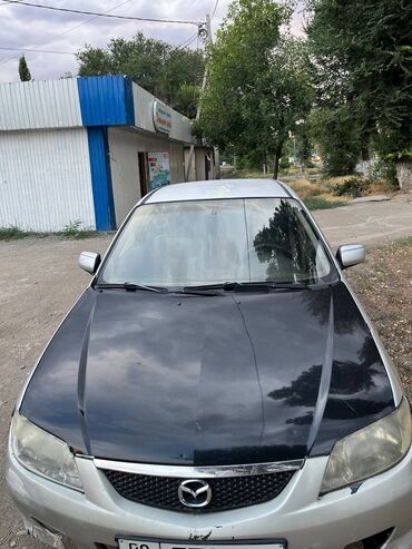 автомобиль нексия: Mazda 323: 2002 г., 1.6 л, Механика, Бензин, Универсал