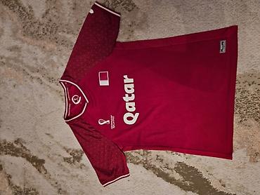 Kişi geyimləri: Qatar 2022 World Cup t-shirt Doha şəhərindən fanshopdan alınıb — 2