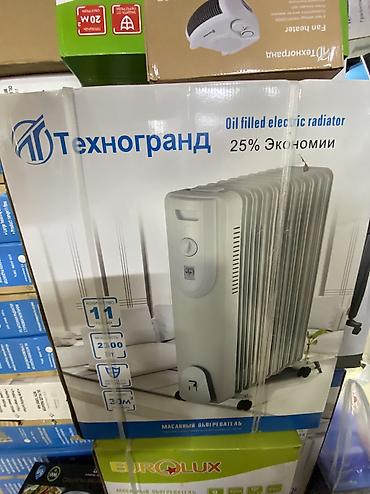 котел для отопления электрический: Масляный обогреватель Кол-во секций: 10 и более, Встроенный вентилятор — 1