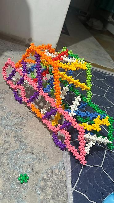 Модульные покрытия, пазлы: Конструктор «Снежинки» из разноцветных пластиковых деталей в одном — 16