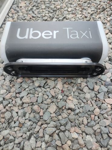 знак такси: Автомобильная вывеска Uber Taxi, разработанная для установки на крышу