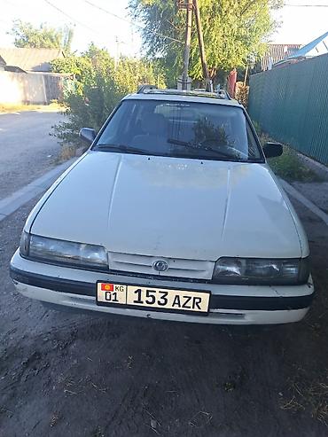 626: Mazda 626: 1993 г. — 6