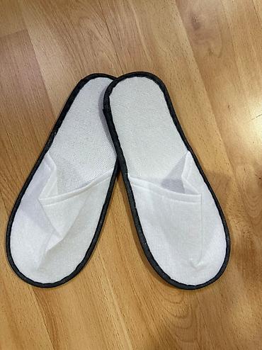 Домашние тапочки: ОДНОРАЗОВЫЕ ТАПОЧКИ. Пара одноразовых тапочек белого цвета с закрытым — 9