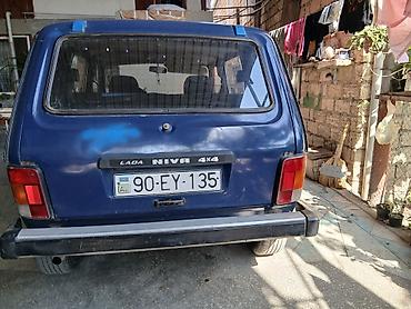 lada diskləri: LADA Niva 4x4, mavi rəng, 5 qapılı universal kuzov. Xüsusiyyətlər: - — 2