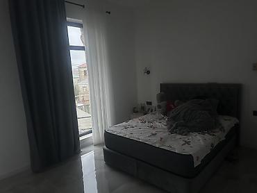 ev alqi satqi gence: İki mərtəbəli, dekorativ daş üzlü memarlıq üslublu fərdi yaşayış evi — 2