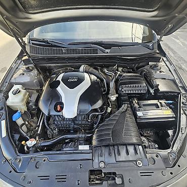 kia optima spoyler: Kia Optima Turbo – sedan Xüsusiyyətlər: - Turbo benzin mühərriki — 10