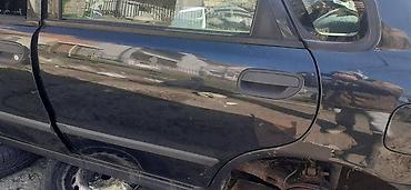 sa staklom: VRATA ZA VOLVO S40 OD 1996. DO 2005. GOD. | odlična zadnja leva — 2