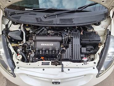 митсубиси спайк стар: Honda Fit: 2002 г., 1.3 л, Автомат, Бензин, Хэтчбэк — 8