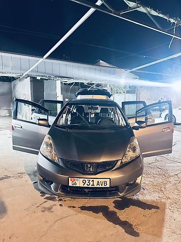 кю 7: Honda Fit: 2009 г., 1.5 л, Автомат, Бензин, Хэтчбэк — 3