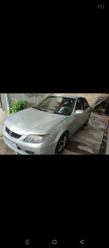 Mazda: Mazda 323: 2000 г., 1.6 л, Механика, Бензин, Седан
