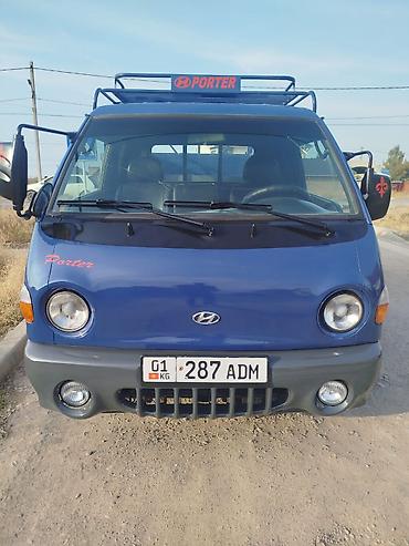 smart open: Hyundai Porter — компактный бортовой грузовик синего цвета. Основные — 7