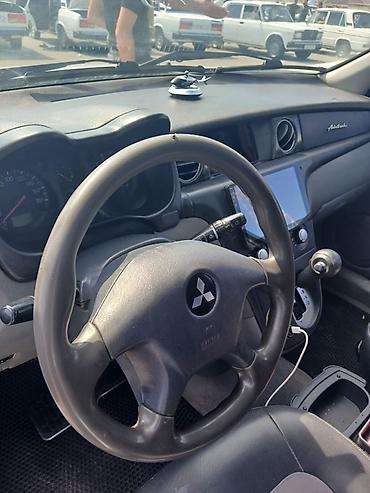 Mitsubishi: Mitsubishi Airtrek, gümüşü rəng, 5 qapılı krossover/gəzinti — 9