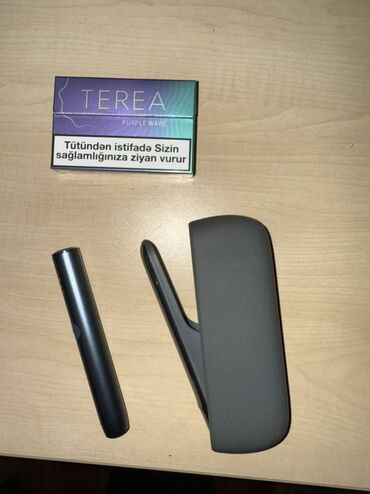 айкос баку цена: IQOS ILUMA cihazı və TEREA Purple Wave tüstü qutusu Paketdə olanlar