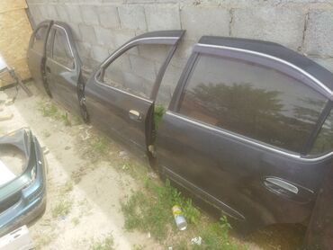 Другие автозапчасти: Nissan Cefiro Maxima A33 Ниссан Цефиро Максима А33 дверь двери Цена