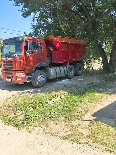 Самосвал FAW (6x4) Описание: - Трехосный самосвал с