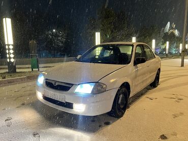 сидан: Mazda Familia: 1998 г., 1.5 л, Автомат, Бензин, Седан