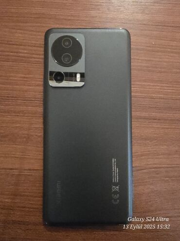 soyuducu işlenmiş: Xiaomi 13 Lite, 256 GB, rəng - Qara, 
 İki sim kartlı