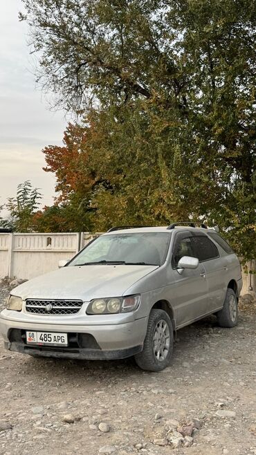 коврик держатель для телефона в машину: Nissan Prairie: 1998 г., 2.4 л, Автомат, Бензин, Вэн/Минивэн