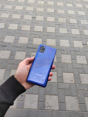 Samsung: Samsung Galaxy A31, 64 ГБ, цвет - Синий, Кнопочный, Отпечаток пальца