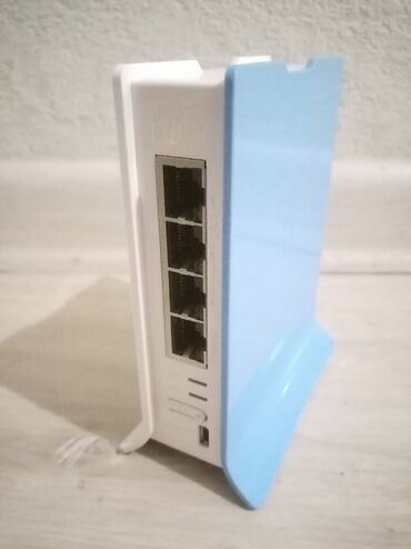 домашний интернет: Wi-Fi роутер MikroTik hAP lite tower case RB941-2nD-TC. Домашняя