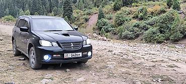 мицу биси: Mitsubishi Airtrek: 2002 г., 2 л, Автомат, Бензин, Кроссовер — 2