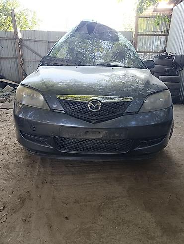 лак авто: Mazda 2, хэтчбек, механическая коробка передач. объем 1.3 — 1