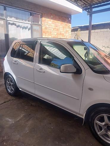 outback xt: Mazda Demio: 2003 г., 1.3 л, Автомат, Бензин, Хэтчбэк — 4