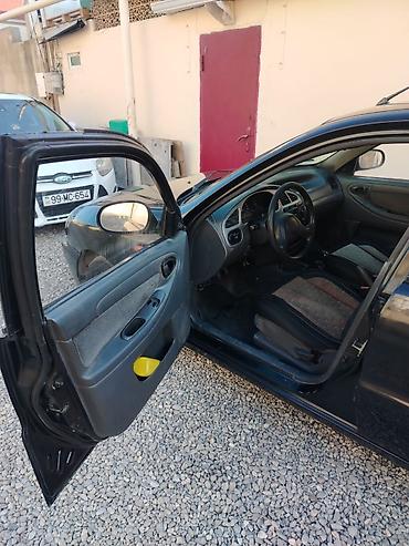 Daewoo: Daewoo Nexia: 1.3 l | 2010 il Sedan — 10