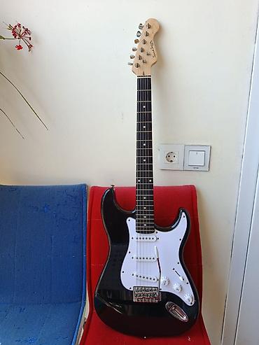 Gitaralar: Elektron gitara, 6 sim, İşlənmiş, Ünvandan götürmə — 1
